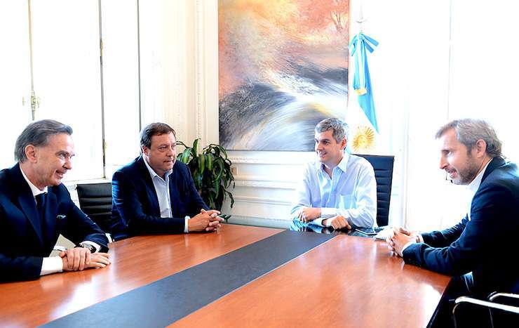 Frigerio y el gobernador Weretilneck. El senador Pichetto también estuvo presente.